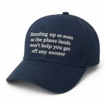 Standing Up As Soon As The Plane Lands Won't Help You Get Off Any Sooner Hat